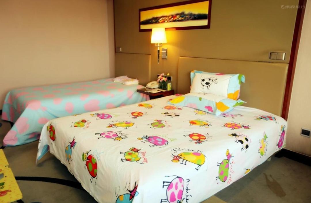 อินโซนการ์แลนด์โฮเต็ลจิแนน Hotel จี่หนาน ภายนอก รูปภาพ