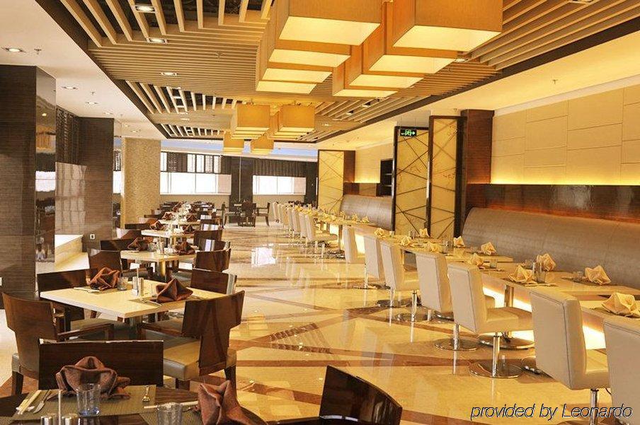 อินโซนการ์แลนด์โฮเต็ลจิแนน Hotel จี่หนาน ร้านอาหาร รูปภาพ