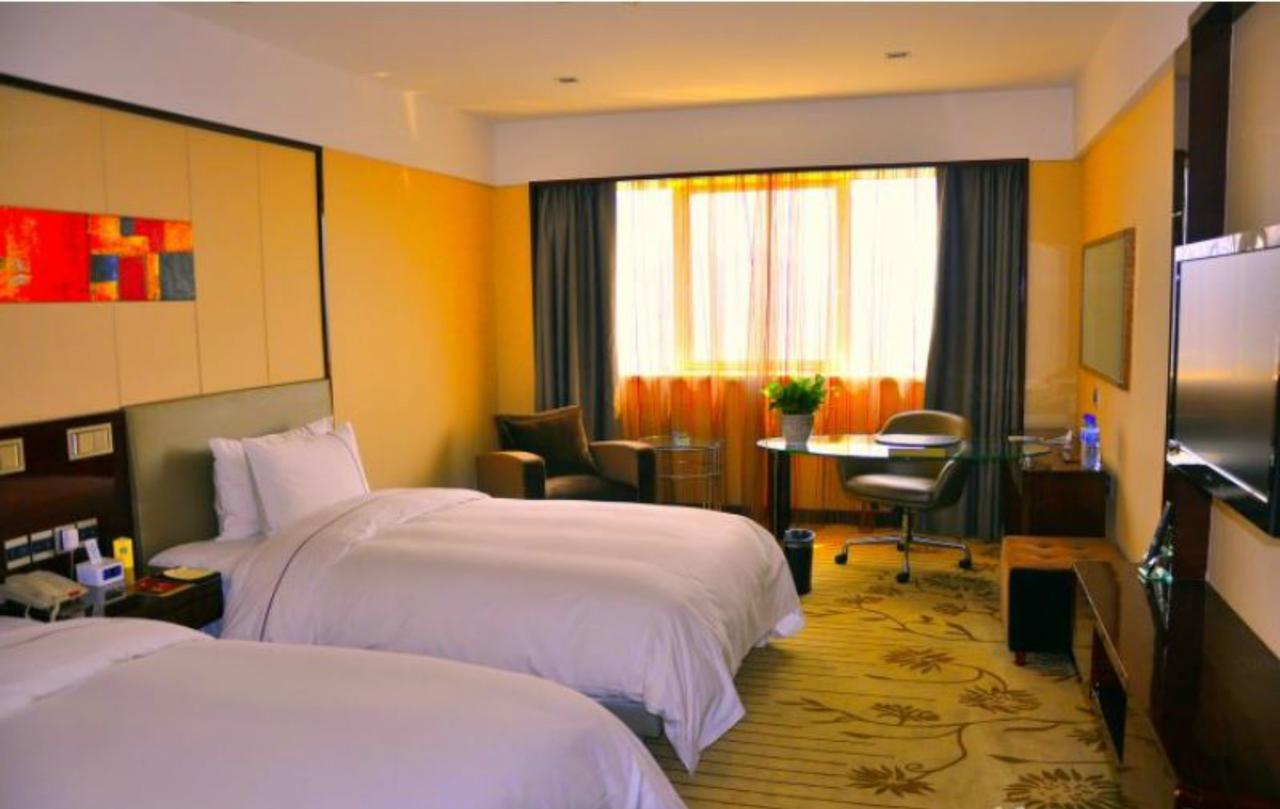 อินโซนการ์แลนด์โฮเต็ลจิแนน Hotel จี่หนาน ภายนอก รูปภาพ